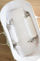 Cojines antivuelco blanco liso lazo Carlota