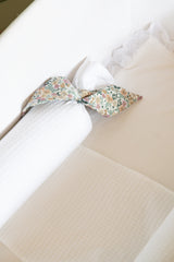 Cojines antivuelco blanco liso lazo Carlota